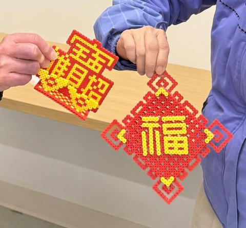 Two red and yellow crafts for Chinese audiences