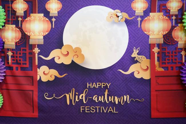 Mid-Autumn Festival display with lanterns and doors opening out to show a full moon.